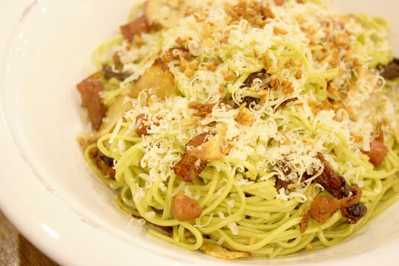 Green pasta with parmesan and crispy toppings at Happy Garden Cafe